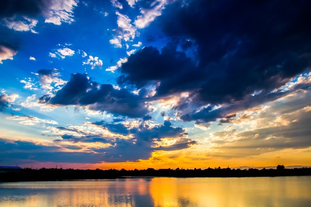 Colorful dramatic sky with cloud at sunset