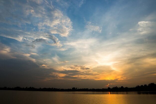 Colorful dramatic sky with cloud at sunset