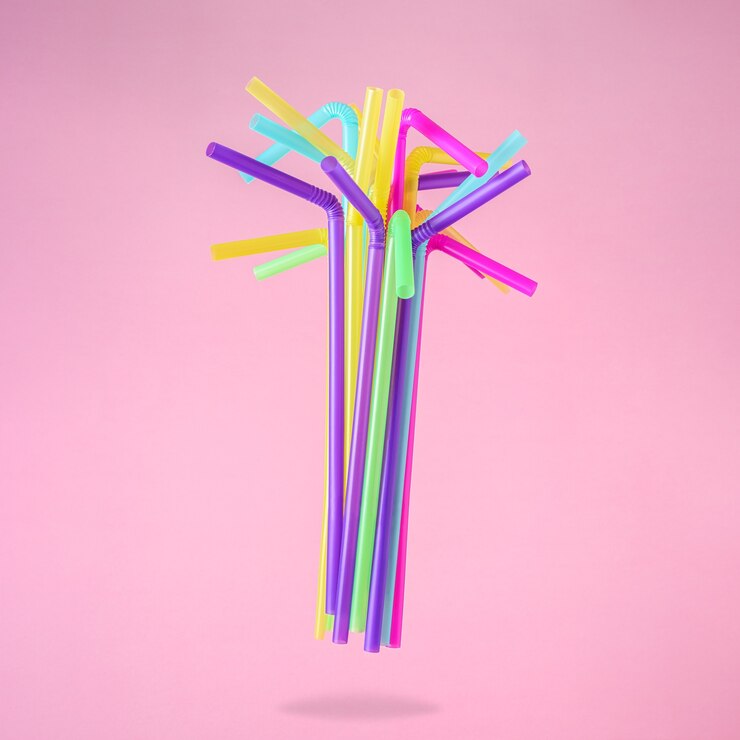 Colorful drinking straws isolated on pink