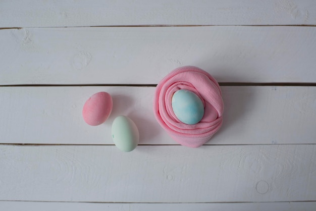 Colorful Easter eggs are lying on the table