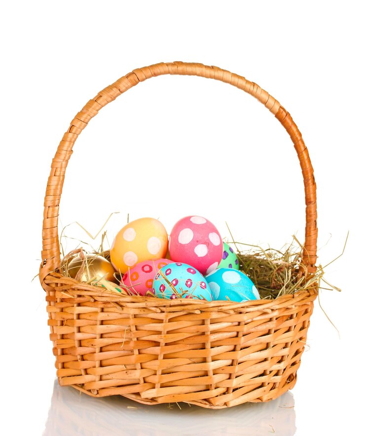 Photo colorful easter eggs in the basket isolated on white