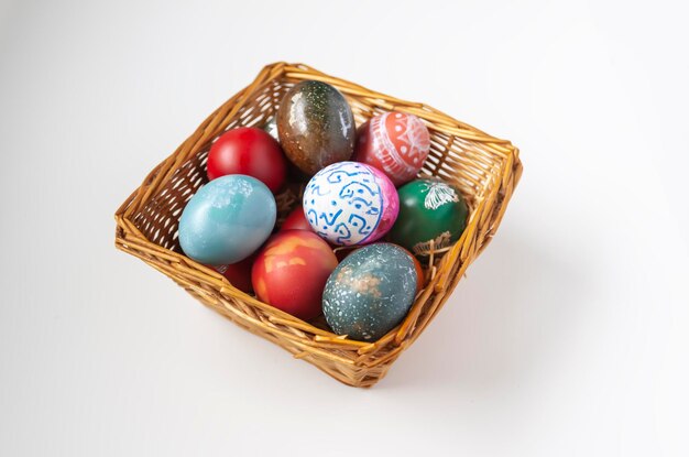 Colorful Easter eggs in a basket Traditional festive decor