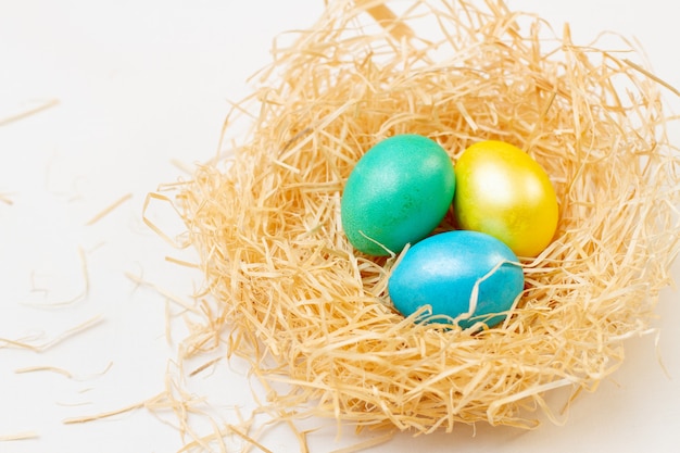 Colorful easter eggs in basket