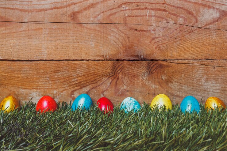 Colorful Easter eggs on the grass