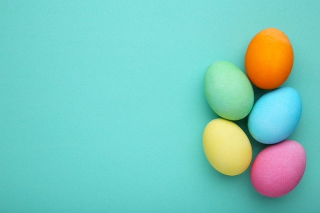 Colorful easter eggs on a mint 