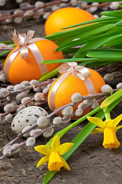 Colorful easter eggs on old wooden background