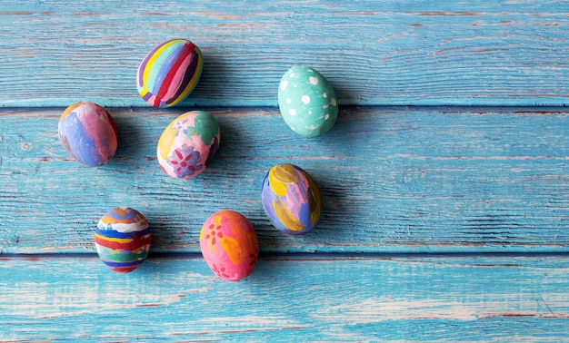 Colorful Easter eggs on table. Easter festive holidays concept.