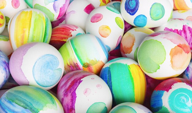 Colorful Easter eggs with watercolor at Easter in a heap