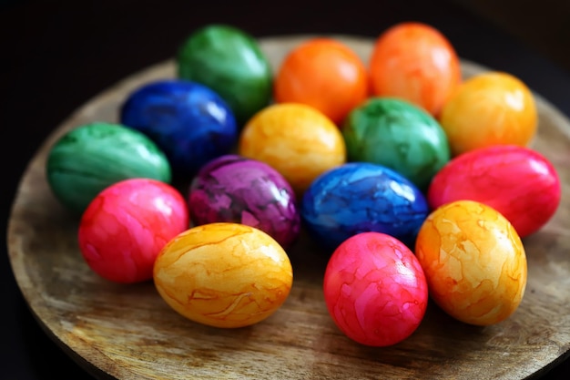 Colorful Easter eggs on a wooden surface