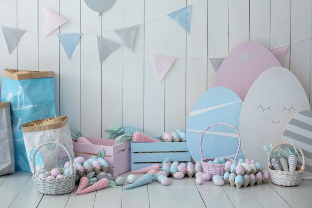 Colorful Easter room interior with lots of colorful Easter eggs and carrots