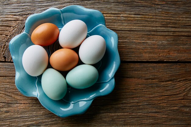 Colorful eggs in white brown and blue colors