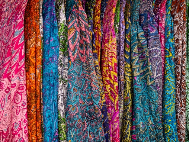 Colorful fabrics for sale on a street in Medina of Marrakesh Morocco