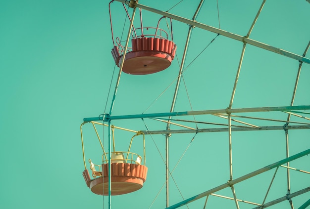 Colorful ferris wheel cabins