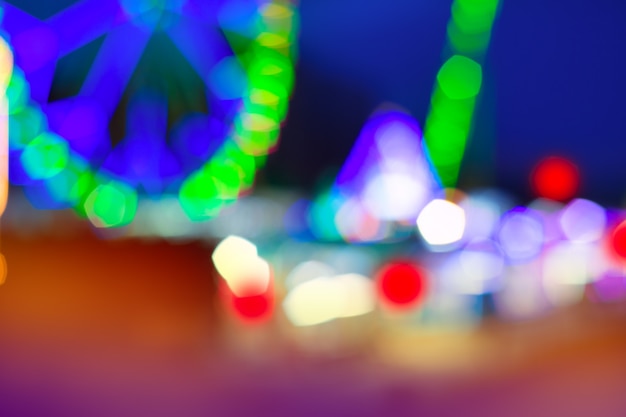 colorful ferrys wheel fairground night lights