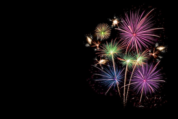 Colorful fireworks celebration and the night sky background