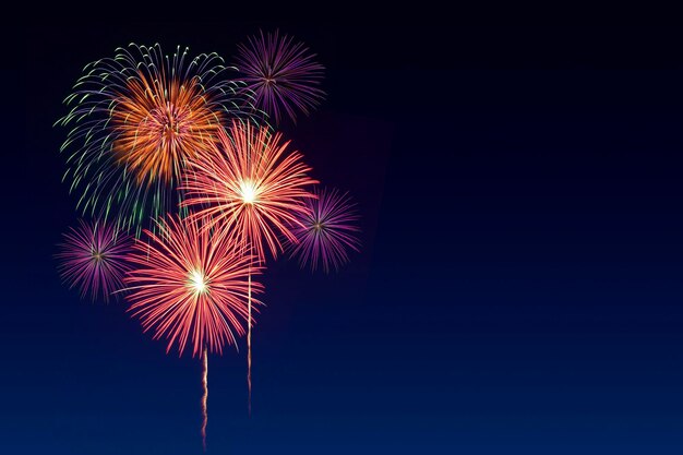 Colorful fireworks celebration and the twilight sky background