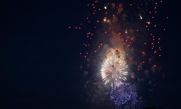 Colorful fireworks on dark sky