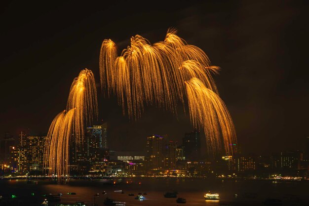 Colorful fireworks harbor and International fireworks at pattaya thailand festival.