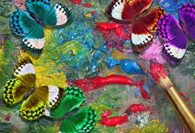 colorful fish are on the ground and the colorful fish are floating in the water.