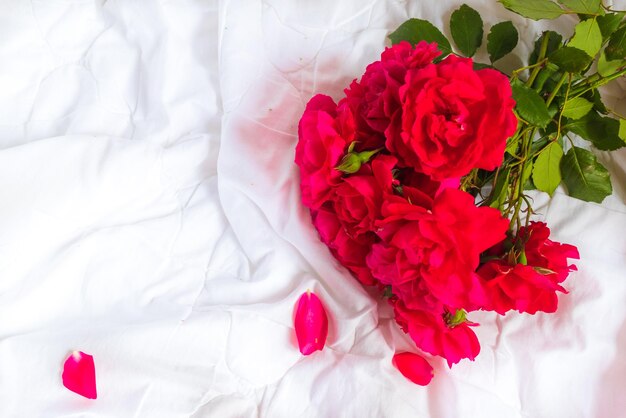 Colorful flower bouquet from red roses isolated on white background Closeup