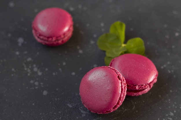 Colorful french macarons cookies (macaroons). Dessert for served with tea or coffee break. Holiday gift for women.