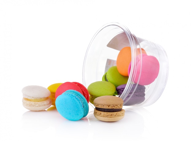 Colorful french macarons on white wall