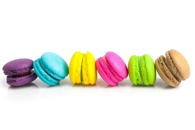 Colorful french macaroons on a white background.