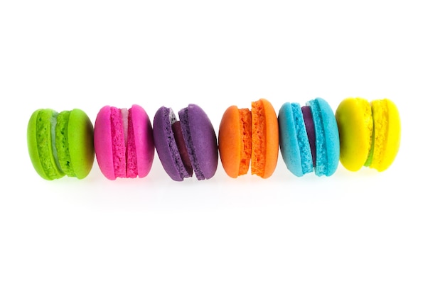 Colorful french macaroons on a white.