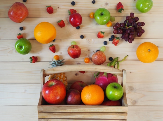 Colorful fresh fruits background, healthy eating concept.