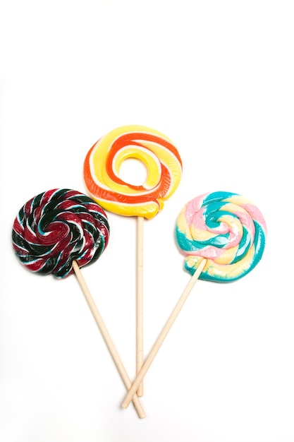 Colorful fruit candies isolated over a white background