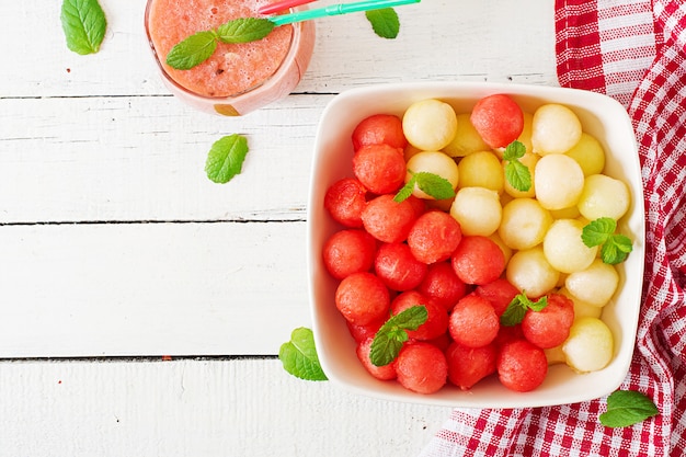 Colorful fruit salad. Watermelon and melon salad. Fresh summer food. Top view