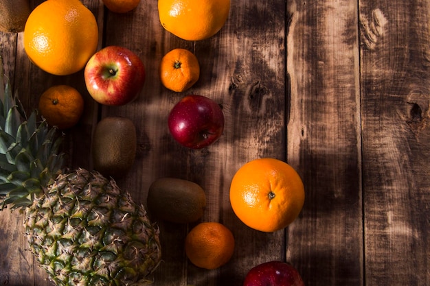 Colorful fruits on wooden table