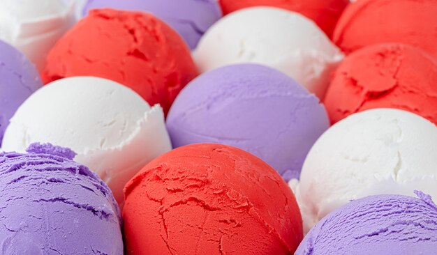 Colorful fruity ice cream scoops. Close up