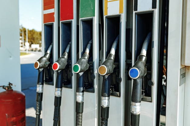 Colorful fuel dispensing valves at gas station