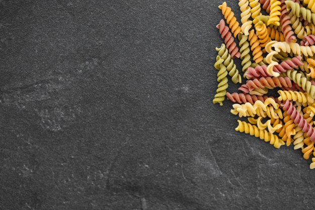 Colorful fusilli pasta Multicolor spiral macaroni Closeup