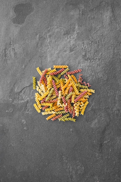 Colorful fusilli pasta Multicolor spiral macaroni Closeup