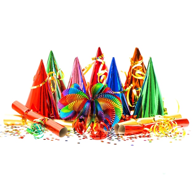 Colorful garlands, streamer, party hats and confetti. festive decoration