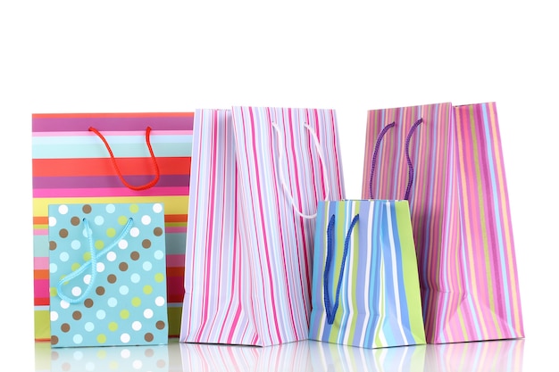 Colorful gift bags isolated on white