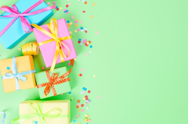 Colorful gift boxes and paper confetti