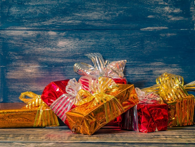 Colorful gift boxes on a wooden table