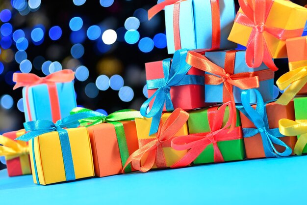 Colorful gifts close-up on a bokeh background