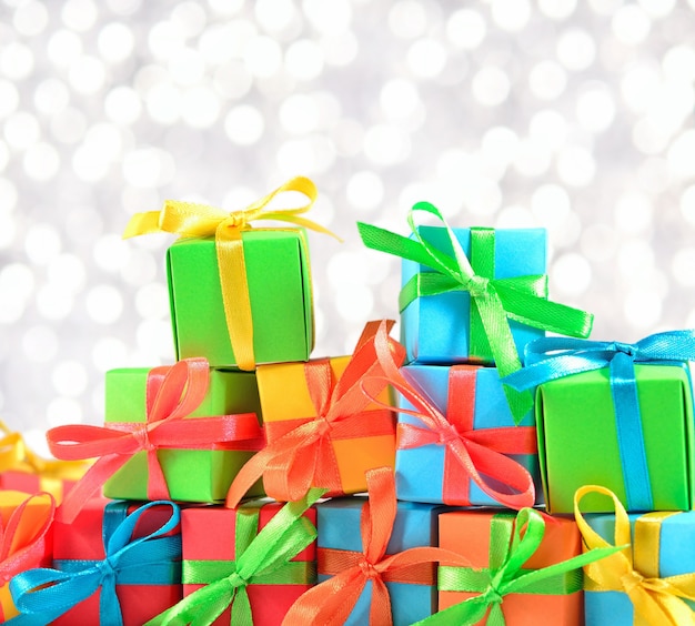 Colorful gifts close-up on a bokeh background