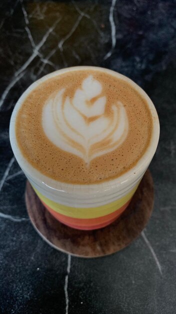 Colorful glasses filled with picollo coffee on the table