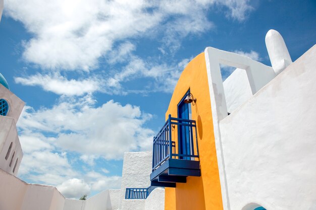 Colorful greece traditional house style with beautiful summer sky background