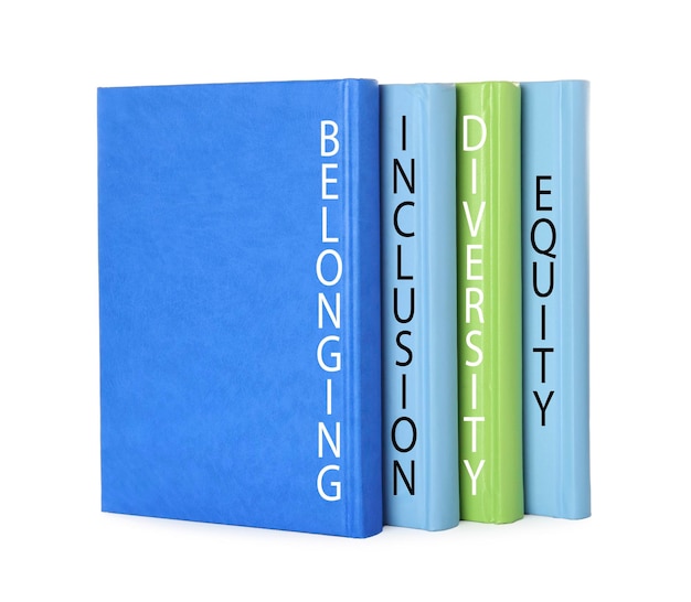 colorful hardcover books with words belonging diversity equity inclusion on white background
