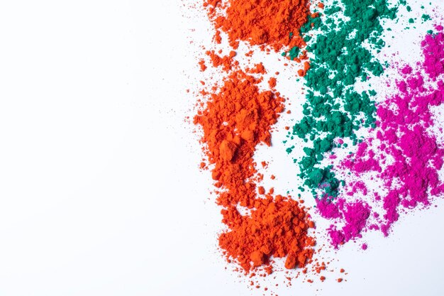 Photo colorful holi powder isolated on white background holi is indian festival of colors