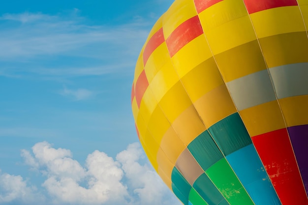 Colorful hot air balloon flying at the natural park and garden. Travel in Thailand and Outdoor adventure activity.