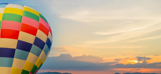 Colorful hot air balloon flying at the natural park and garden. Travel in Thailand and Outdoor adventure activity.