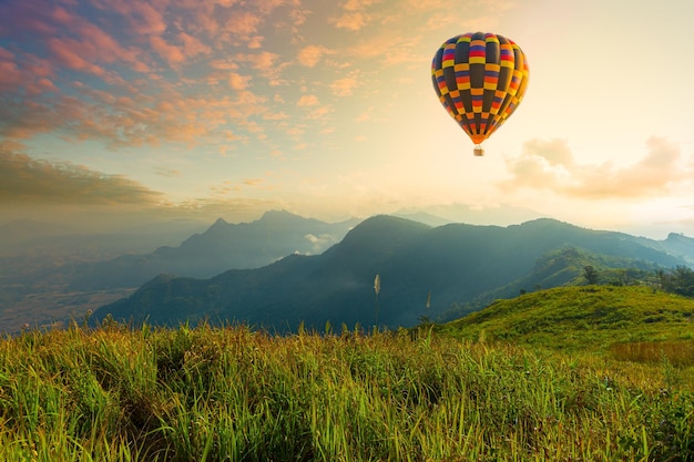 Colorful hot air balloons flying over mountain at Dot Inthanon in Chiang Mai Thailand