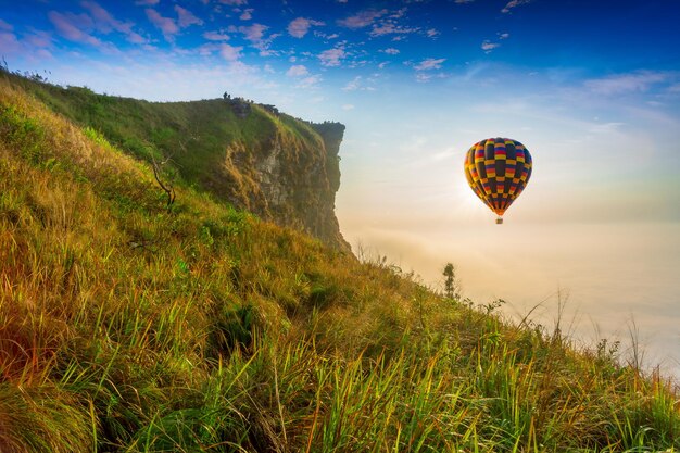 Colorful hot air balloons flying over mountain at Dot Inthanon in Chiang Mai Thailand